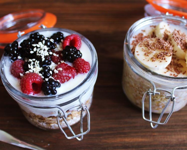 Image of two glass jars full of yogurt and fruit
