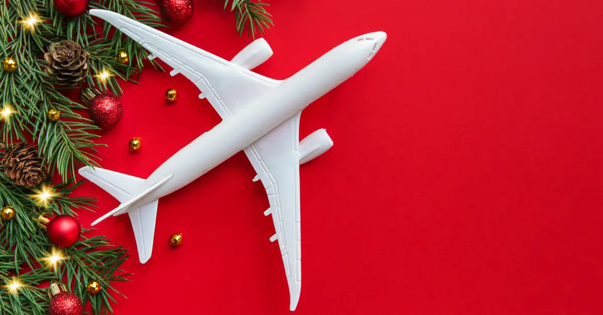 holiday travel plane with wreath